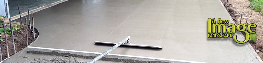 A close up of a concrete slab with a metal handle